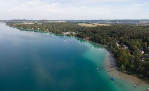 High angle view of swimming pool by sea against sky