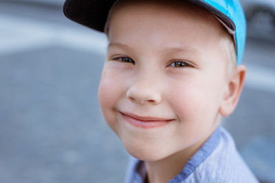 Close-up portrait of smiling boy