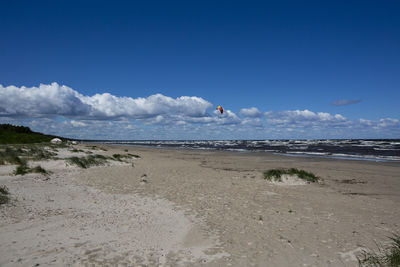 Scenic view of beach against sky and lonely kite on jurmala beach 