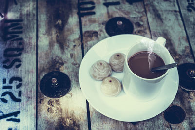 Close-up of coffee cup on table