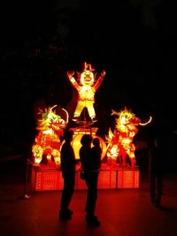 Illuminated lanterns at night