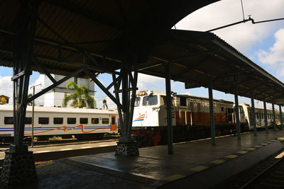 Train on railroad station platform against sky