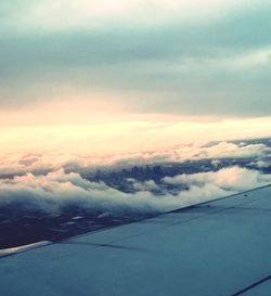 Scenic view of landscape against cloudy sky
