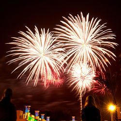 Firework display at night