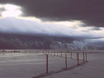 Scenic view of landscape against sky during winter