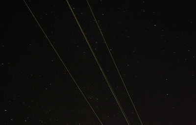 Low angle view of star field against sky at night