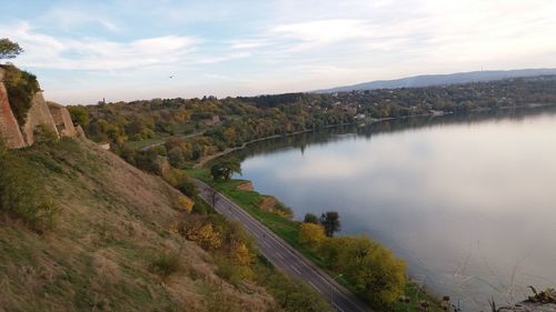 Scenic view of calm lake against mountain range