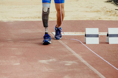 Low section of man running