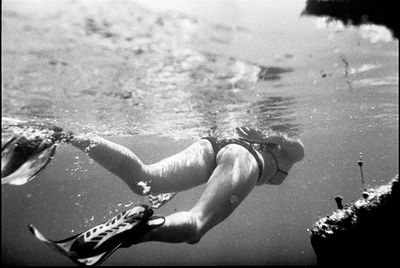 Legs of woman in water