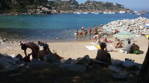 People enjoying at beach