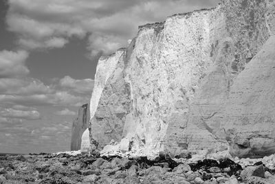 Rock formation on land against sky