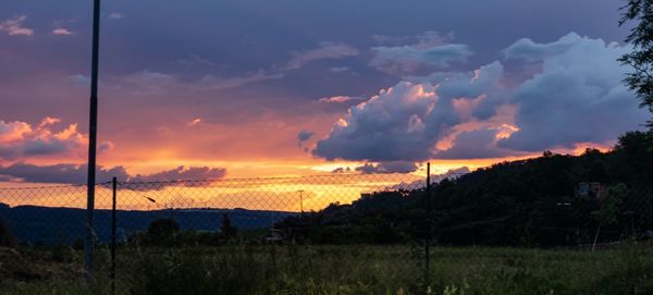 Scenic view of dramatic sky during sunset