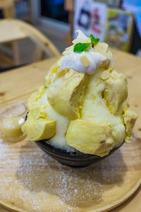 Close-up of ice cream in plate on table