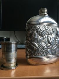 Close-up of glass jar on table