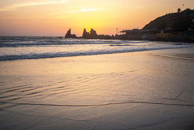 Scenic view of sea against sky during sunset