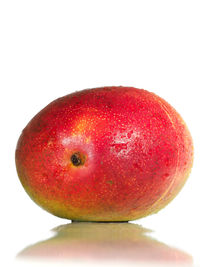 Close-up of red cherries on white background