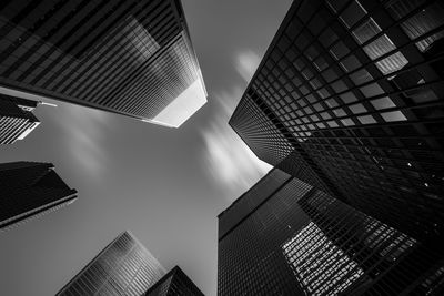 Low angle view of skyscrapers against sky