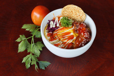 High angle view of fruit salad in bowl on table