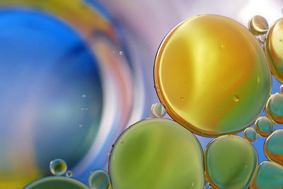 Low angle view of balloons against sky