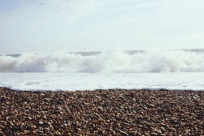 Waves splashing on beach