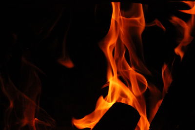 Close-up of fire against black background