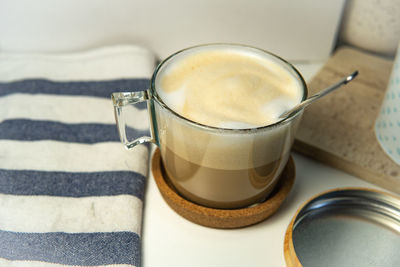 High angle view of coffee cup on table