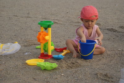Playing sand at the beach