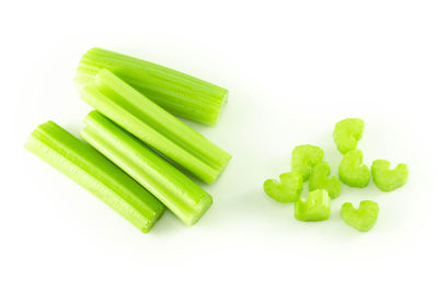 High angle view of chopped vegetables against white background