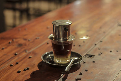 High angle view of coffee cup on table