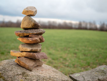 Close-up of stone stack on rock