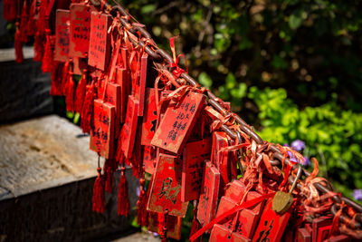 Close-up of red tied up of temple