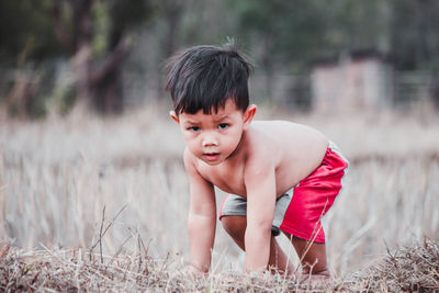 Portrait of shirtless boy
