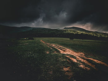 Scenic view of land against sky