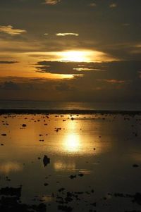 Scenic view of sea at sunset