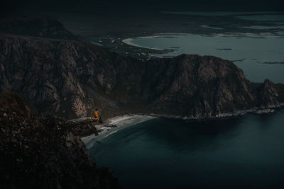 High angle view of rock formations by sea