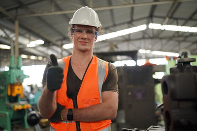 Portrait of man standing in gym