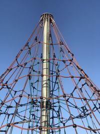 Low angle view of tower against clear blue sky