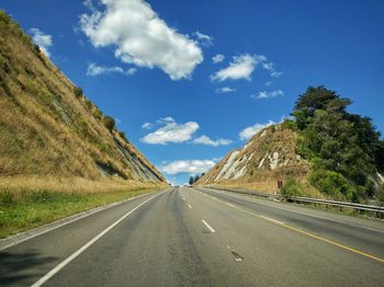 Empty road against sky