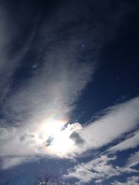 Low angle view of snow against sky at night