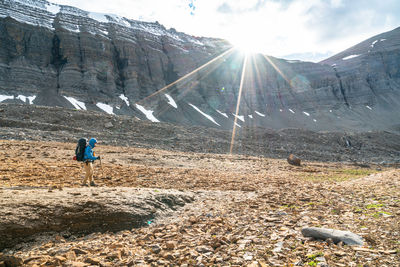 Hiking next to mount wilson's massive rockwall near michelle lakes