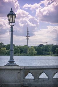 Street light with city in background