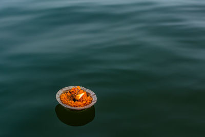 Oil lamp floating into river ganga at varanasi.