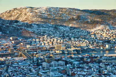 High angle view of illuminated buildings in city