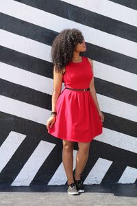 Portrait of woman in red dress