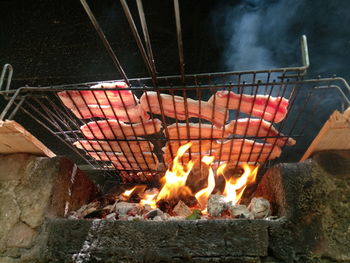 High angle view of fire on barbecue grill