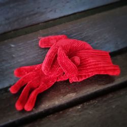 Close-up of red leaf on table