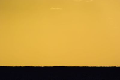 Scenic view of landscape at sunset