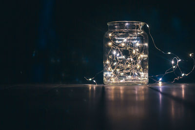 Close-up of glass jar on table