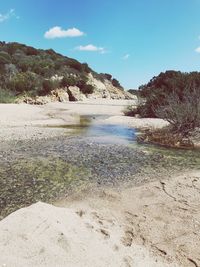 Scenic view of land against sky