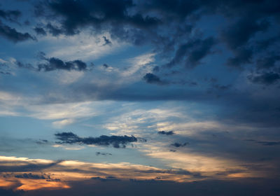 Low angle view of clouds in sky during sunset